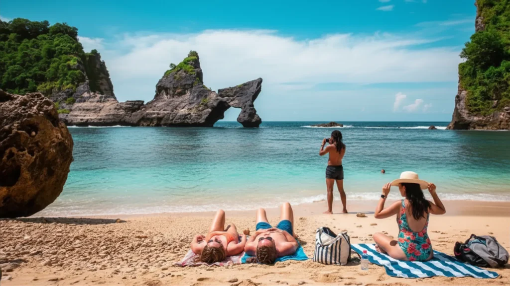 Clear turquoise waves gently rolling onto the pristine shoreline of atuh beach nusa penida