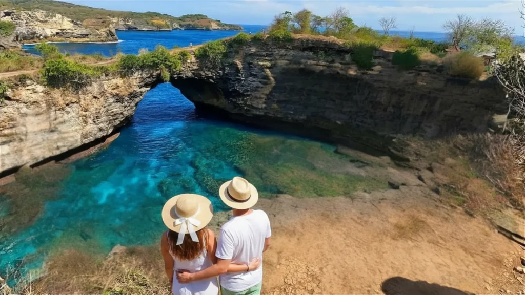 Overhead circular viewpoint of the enclosed sea water cove at broken beach nusa penida
