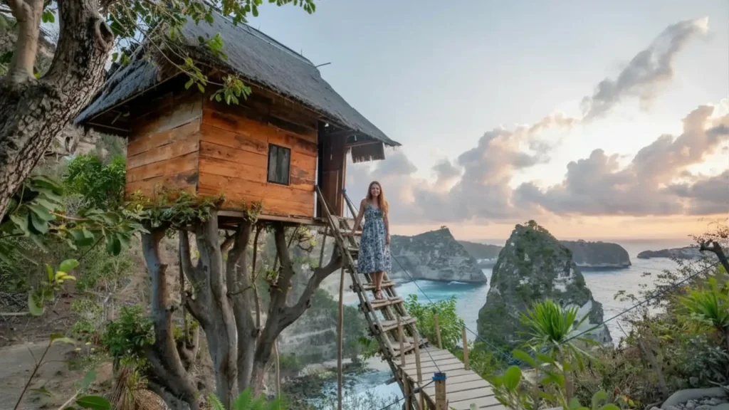 The famous wooden tree house nusa penida built on a cliff overlooking the ocean